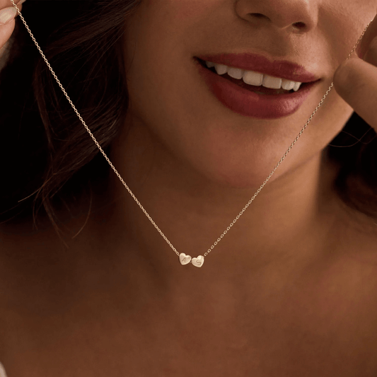 Collana personalizzata con iniziale e ciondolo a forma di cuore