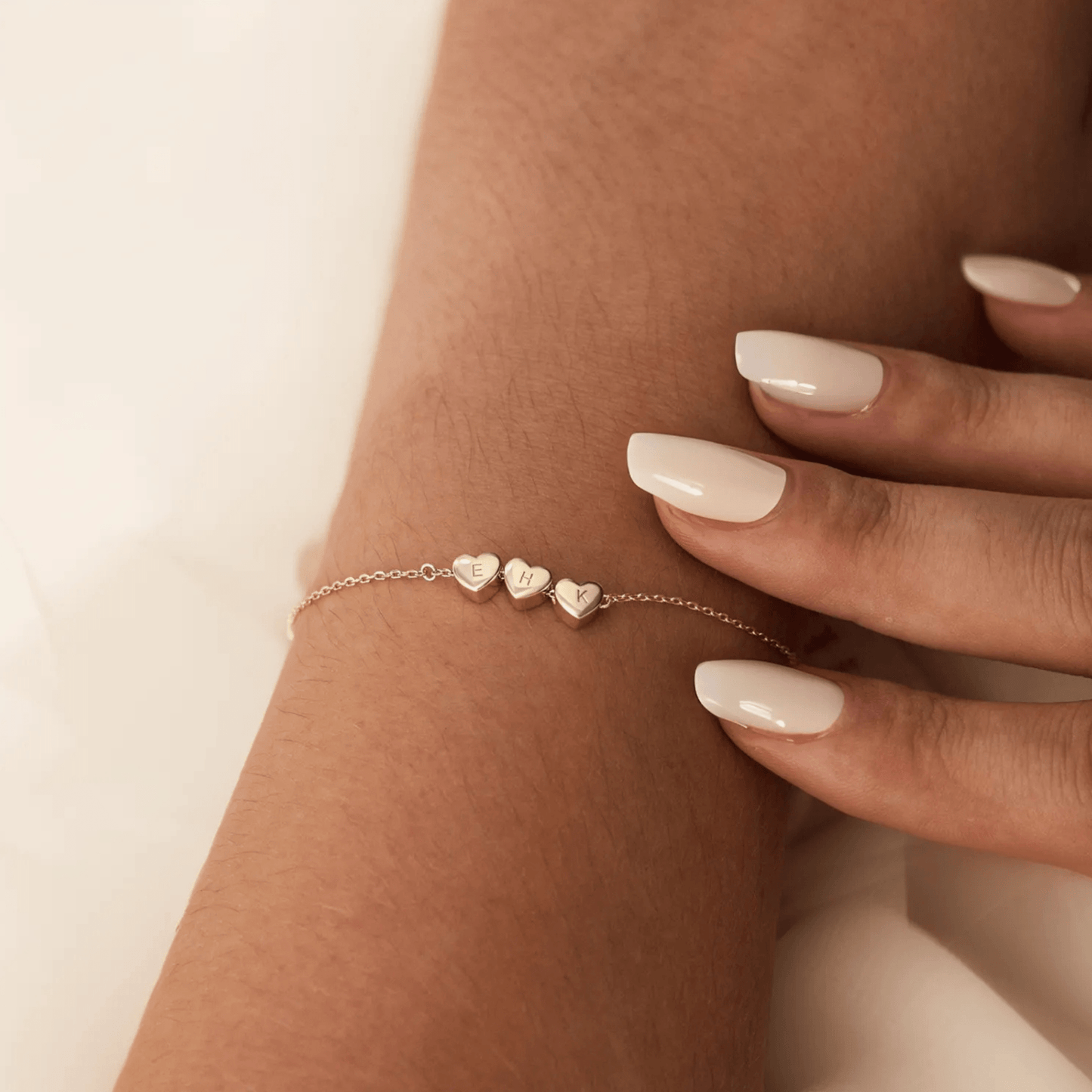 Bracciale personalizzato con iniziale e ciondolo a forma di cuore