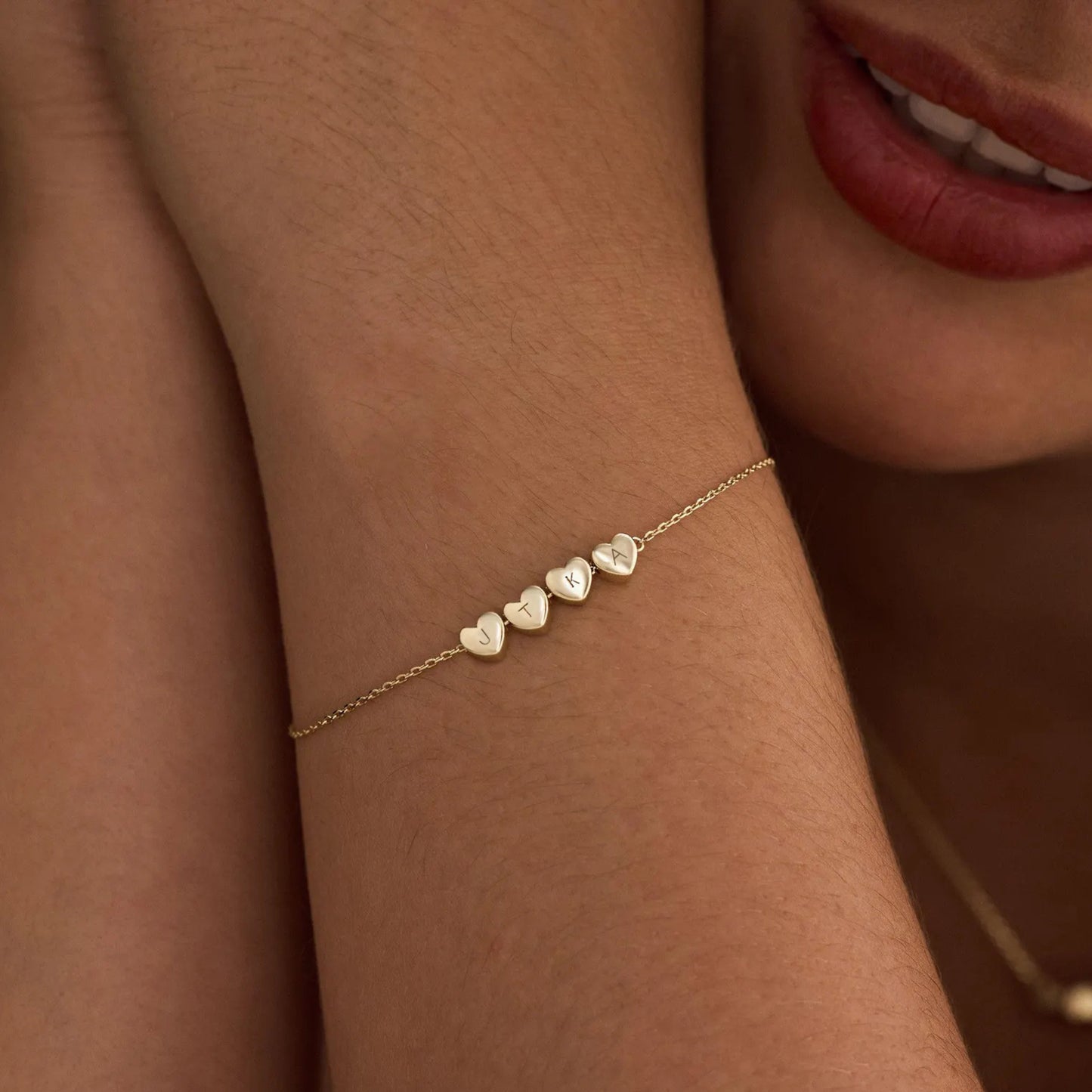 Bracciale personalizzato con iniziale e ciondolo a forma di cuore